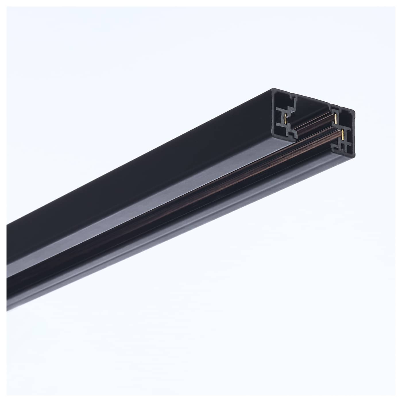 A close-up of a black linear LED light guide tube showing its internal channel structure and reflective surfaces, set against a clean white background.