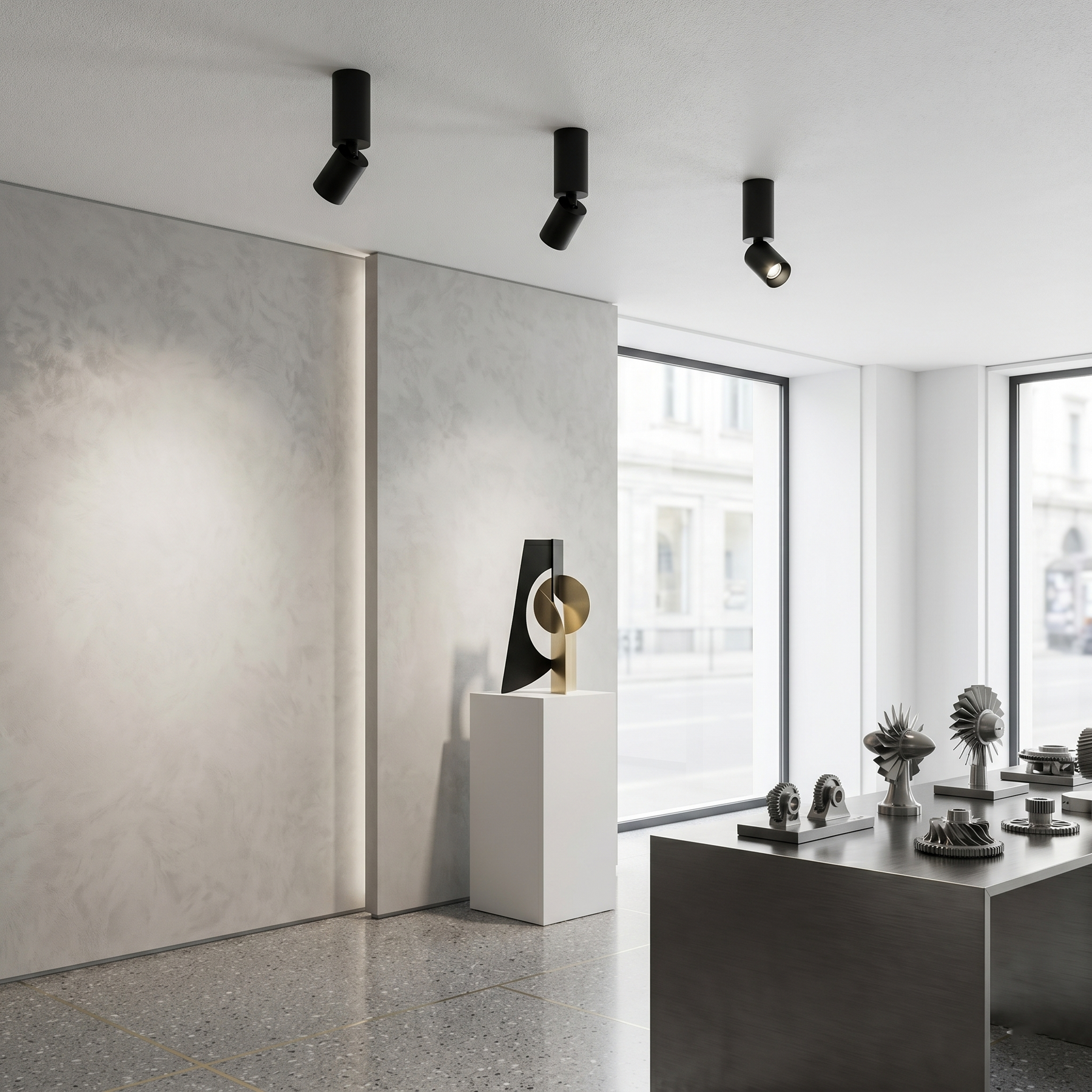 Black led adjustable architectural cylinder spotlights with adjustable heads mounted on ceiling in black finish