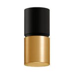 A modern cylindrical wall light fixture with a matte black upper shade and a brushed gold lower shade, shown against a plain white background.