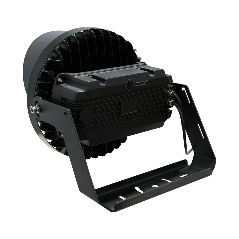 A black industrial LED stadium light with a ribbed housing, circular reflector, and adjustable mounting bracket, shown on a plain white background.