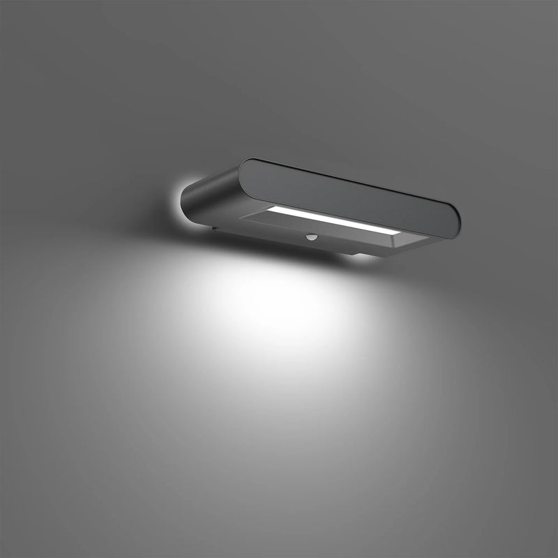 Modern silver rectangular ledgeray solar wall light with sleek minimalist design 345 lumens 3W 4000K led luminaire